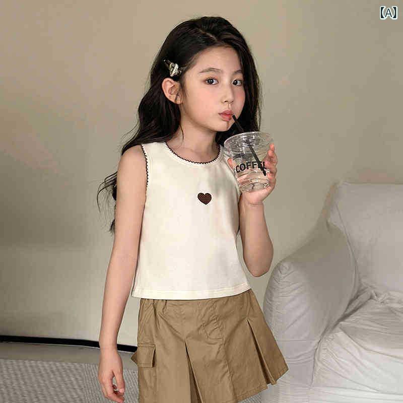 ・カテゴリ: 子供用タンクトップ、子供用キャミソール・対象性別: 女児・スタイル: 韓国風・デザイン: タンクトップ型・対象年齢: 中小童（3～8歳、100～140cm）・生地加工: 柔軟加工・柄: 無地・デザイン要素: プリンセス、トレンド・主な素材: 綿・素材の含有率: 綿 95%・安全基準: A類・ネックライン: クルーネック・フード: なし・カラー展開: アイボリー、ピンク、杢グレー・サイズ展開: 73cm（推奨66-73cm）、80cm（推奨73-85cm）、90cm（推奨85-95cm）、100cm（推奨95-105cm）、110cm（推奨105-120cm）、120cm（推奨120-130cm）、130cm（推奨130-140cm）、140cm（推奨140-150cm）、150cm（推奨150-165cm）