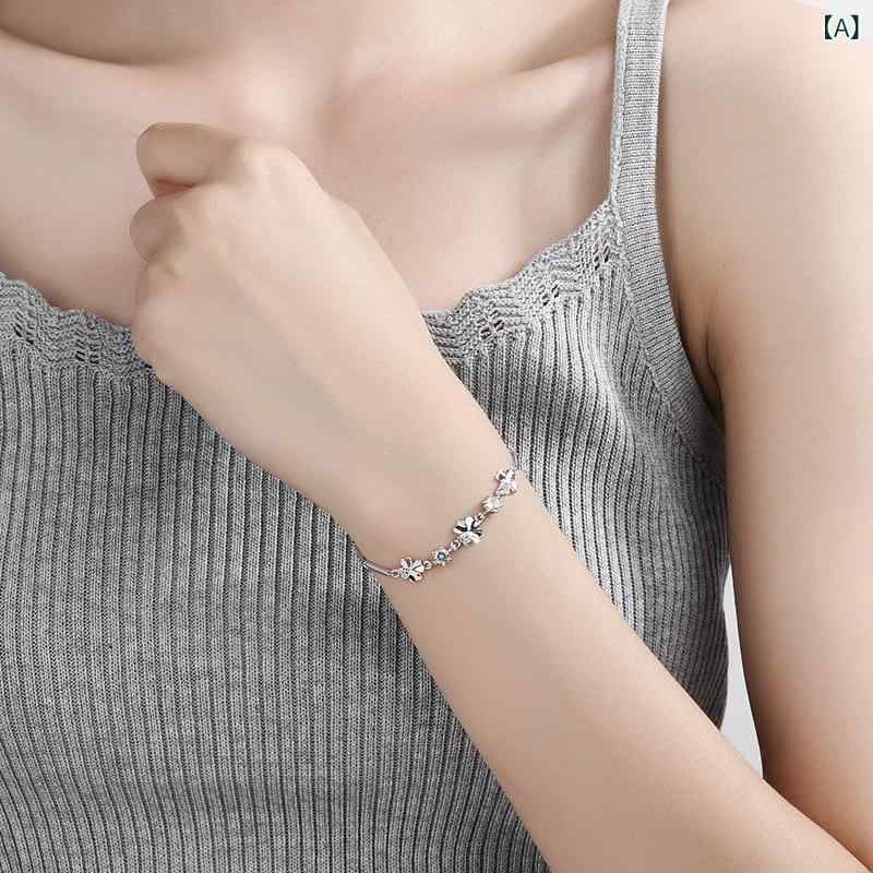 ブレスレット 腕輪 レディース 四つ葉のクローバー 回転 スピナー 幸運 ラッキーアイテム ジルコニア ラインストーン 韓国風 ホワイトゴールドメッキ