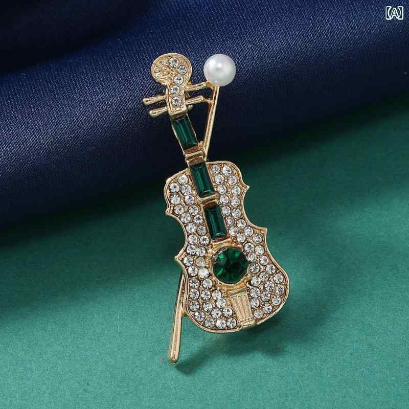 ブローチ ユニセックス 男女兼用 バイオリン 楽器モチーフ クリスタル ラインストーン 小型 金色 おしゃれ かわいい シンプル 上品 高級感 通勤 オフィス ビジネス パーティー ファッション小物