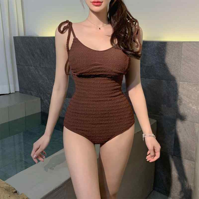 ・カテゴリ: 连体泳衣・スタイル: ワンピース水着、ハイウエスト、セクシー、バックレス、コンサバティブ・対象: レディース・パッド・ワイヤー: 胸パッドあり、ワイヤーなし・生地: 特殊生地・素材: ナイロン 82%、ポリエステル 98%・重量: 約200g・対応シーン: 水泳、ウォータースポーツ・カラー展開: ブラック、ホワイト、カーキ、ブルー、グリーン・サイズ展開: M、L、XL・袖丈: ノースリーブ