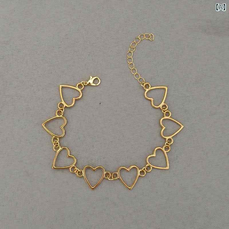 Anklets - アンクレット 女性用 かわいい 心形 モチーフ チェーン デザイン シンプル 合金製 金色 ホワイトゴールド 切り抜き 装飾 ビーチ リゾート 夏 ファッション 軽量 普段使い バカンス 旅行 記念 ギフト 百搭 脚飾り