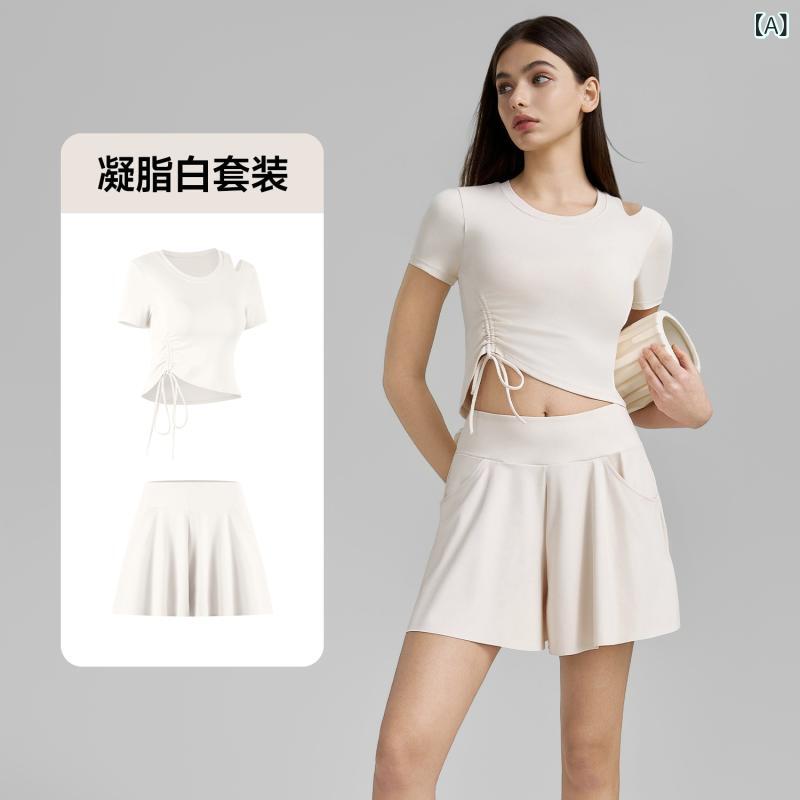 Tops - スポーツウェア 女性用 春夏 トップス 短袖 ラウンドネック ネットスカート テニススカート ドローストリング 切り替え 透け防止 固定カップ ヨガウェア 伸縮性 吸湿速乾 ポリエステル混 紡績 軽量 フィットネス ランニング カジュアル 凝脂白 藤木咖