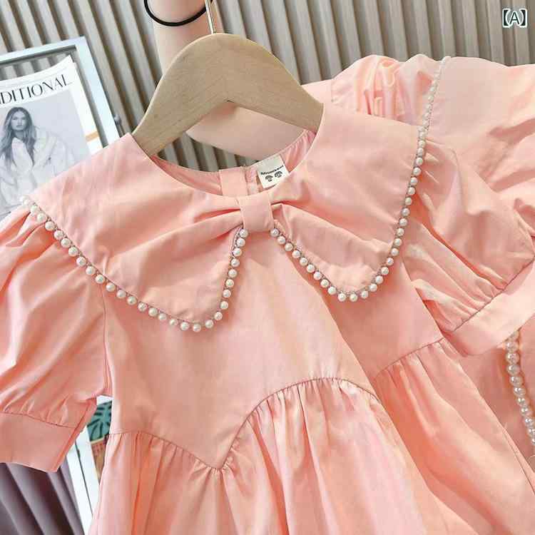 ・カテゴリ: キッズワンピース・スタイル: 韓国・性別: 女の子・対象年齢: 3～8歳（身長100～140cm）・主な素材: 綿・裏地素材: 綿・袖丈: 半袖・柄: 無地・スカート裾: プリンセスライン・デザイン要素: プリンセス・生地加工: 柔軟処理・カラー展開: ピンク・サイズ展開: 90cm, 100cm, 110cm, 120cm, 130cm, 140cm, ママサイズM, ママサイズL