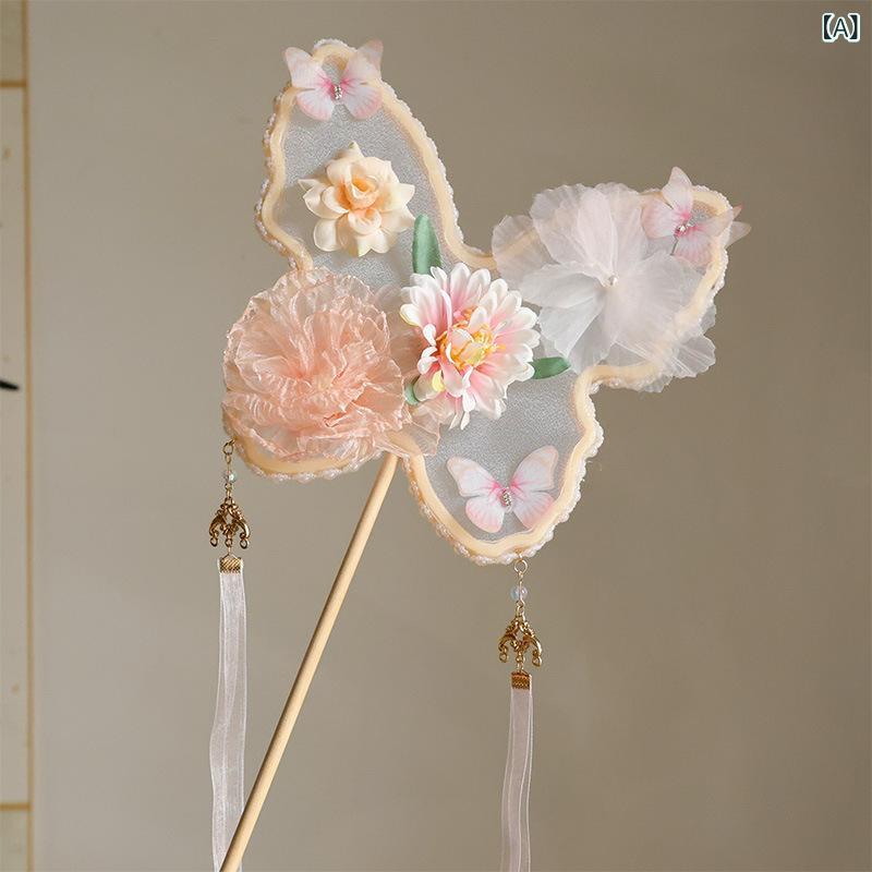 ・カテゴリ: 扇子・素材: 布・サイズ: 26cm・製作: ・骨材: 木・スタイル: 中国風・柄: 蝶・カラー展開: ピンク、緑、ブルー