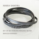 マリア サモラ6連シルバーバングル MARIA SAMORA SET OF SIX STERLING ROLLING SILVER BANGLE/OXIDIZED ◆輸入品販売に関しまして諸注意◆ ※新品、未使用品となりますが 購入先による背中付近に防犯タグのピン穴 　　　　形を整えるための針孔がございます。 　　　　いずれもお洗濯して頂くと消えますが、 　　　　不良品ではございません。 　　　　他、多少のしわや紙タグに欠損がある場合がございます。 ご理解の上、ご検討をお願い致します。 お気になる方は一度お問い合わせの上、ご確認ください。楽天システム変更の為、現在沖縄離島への宅配便送料無料での配送を見合わせております。 詳しくはこちら『宅配便』をご確認ください。 ◆商品説明◆ALLハンドメイド、6連のすべて違う模様が美しいシルバーバングル。いぶされたシルバーがクールな印象です。 ◆MARIA SAMORA◆アメリカ、ニューメキシコ州、タオス生まれ。 タオスのシンプルで美しい生活、文化によって育まれた、 豊かな想像力と確かな技術を持った、才能あふれる若手女性アーティスト。 マリアの作品はその人自身が持っている美しさを洗練し高めてくれるような 五感に響くシンプルなデザインが特徴。 従来のインディアンジュエリーとは一味違う、コンテンポラリーで洗練された アイテムに心惹かれます。 素材 Sterling Silver サイズ サイズ 直径 幅(1本） ONE SIZE 7 0.5 ※単位はすべてcmになります。 注記 ※できるだけ忠実に再現するよう努力しておりますが、 ディスプレイ画面等の環境上、ページで見た色と実際の商品の色とは 多少違う場合がございます。ご不明な点はお問い合わせください。 ※慎重に計測しておりますが、商品によって多少の誤差が出てしまう場合がございますのでその旨ご了承くださいませ。