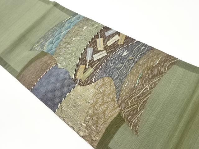 手織り紬紙布すくい織変わり曲線模様織出し袋帯【中古】【着】