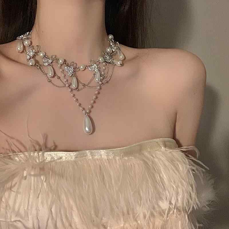 チェーン 鎖骨 ハイエンド 高級 ライト タッセル ネックレス ジルコン 蝶 パール ビューティー BXA