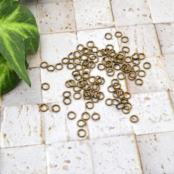 【100円均一】 丸カン 金古美 4mm 約100個 | レジンやハンドメイドアクセの必需品の丸カンが大量！ 手芸 / イヤリング メタルパーツ 雑貨 ハンドメイド パーツ 手芸 (日用品雑貨・文房具・手芸 手芸・クラフト) 手芸 ninastore-10000369 レジンアクセサリーパーツのニーナ サンプル画像3