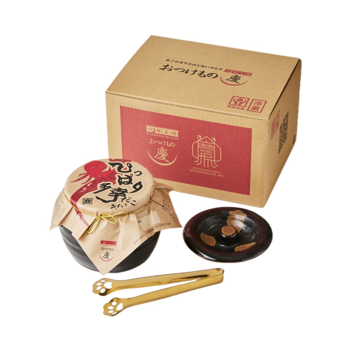 【商品特徴】多くの幸せの連鎖をお祈りして、慶が贈る最幸のギフト「慶のひっぱり多幸キムチ」。 北海道の日本海で水揚げされた極上のタコを、一本一本吊るして蒸し上げた逸品です。 具材は幸せの”しり取り”詰め合わせ。 「慶のひっぱり多幸(だこ)キムチ」は幸運を招く招き猫トング付きです。 【タコ】 古くから赤色には「魔除け」の意味があり、たこが真っ黒な墨を吐いて敵から逃げる姿も「苦難を煙に巻く」と捉えられるので縁起が良いとされています。 また、多幸(たこ)と漢字を当はめて「一年間幸せでいられますように」との願いが込められています。 【こまつな】 小松菜が勝負運をアップさせる縁起物の野菜です。 とされているのは、語り合わせが理由と言われています。 こまつなを「5(合格の5)」と「2(ブイサイン)」と、「7(ラッキーセブン)」と表すことができるからだそうです。 【なす】 夢に見ると縁起がいいと言われているものに「一富士(いちふじ)、二鷹(にたか)、三茄子(さんなすび)」があります。 【スルメイカ】 婚約や結婚のお祝いでは、スルメを「寿留女」と書いて、「花嫁が逃げ出さずに末永く留まってくれるようにとの願いをこめる」という縁起担ぎとして使われています。 【カクテキ(大根)】 カクテキ(大根) 大根は土深くに根を張ることから、大根がたくさん埋まっている土地は、それだけ地盤が安定していて、少々のことでは家が傾いたりしないのだとか。 【きんかん】 「金冠」と掛けられていて黄金のような、まばゆい色と合間って富を象徴しています。 また、名前の中に運を意味する「ん」が入っているので「金運」を上げてくれる食材として食されます。 以上の六種の具材を慶キムチの素で和え、壺入りにしました。 六は「無」に通じることから、災いを無にする、病災難を追い払う数字とされています。 商品説明メーカー所在地 原材料 タコ(北海道産)、こまつな、なす、スルメイカ、カクテキ、金柑、漬け原材料(漬け原材料（大根、唐辛子(中国)、砂糖、白桃、にんにく、食塩、ねぎ、にら、りんご、イカの塩辛、アミの塩辛/調味料(アミノ酸等)、酸味料 サイズ 200×250×150(mm) 原産国 日本 内容量 808g(招き猫トング付き) アレルギー表示 小麦、大豆、えび、いか、りんご、もも 温度帯 冷蔵 メーカー名 有限会社グリーンフーズあつみ神奈川県川崎市川崎区大島3-35-7