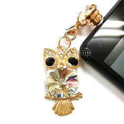 イヤホンジャックフクロウふくろうスマホケースピアスホコリ防止ゴールド水侵入防止ラインストーンキラキラアクセサリーイヤホン穴カバースワロフスキー風かわいいキュートiphone6xperiagalaxy