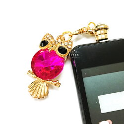 イヤホンジャックフクロウふくろうスマホケースピアスホコリ防止ゴールド水侵入防止ラインストーンキラキラアクセサリーイヤホン穴カバースワロフスキー風かわいいキュートiphone6xperiagalaxy