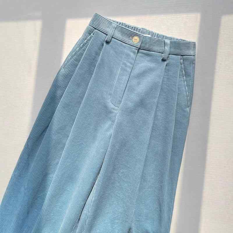・カテゴリ: 休闲裤・スタイル: 休闲风・主な素材: 聚酯纤维・主素材含有量: 80%以上・パンツ型: 直筒裤・レッグ幅: 阔腿・パンツ丈: 長丈・ウエスト: 高腰・厚み: 中厚・流行要素: 灯芯绒・カラー展開: 浅藍色・サイズ展開: S,M,L,XL・加工: 拼贴/拼接