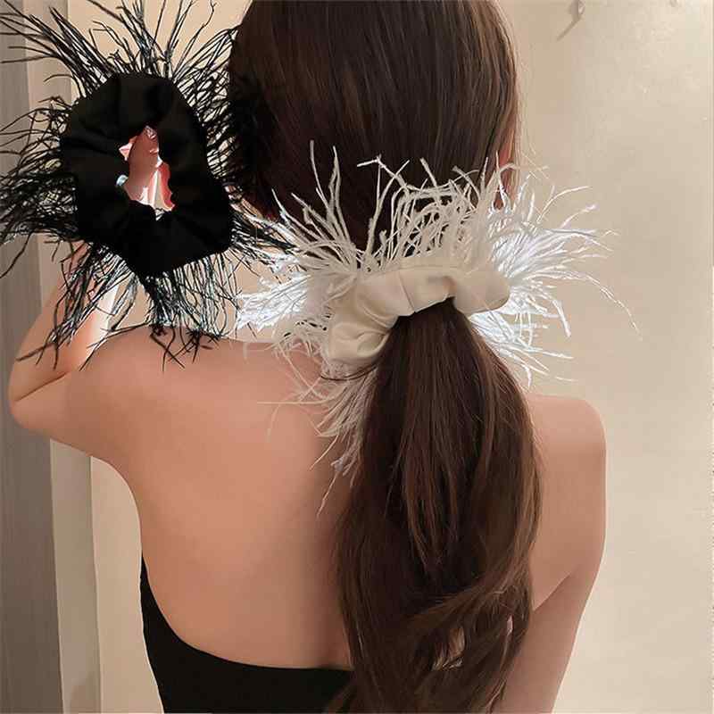 ・カテゴリ: ヘアアクセサリー・主な素材: 布・加工: 手作り・流行要素: 羽毛・スタイル: 軽奢風・デザイン: ゆったり型・スタイル分類: ファッション通勤・カラー展開: ブラック、ホワイト