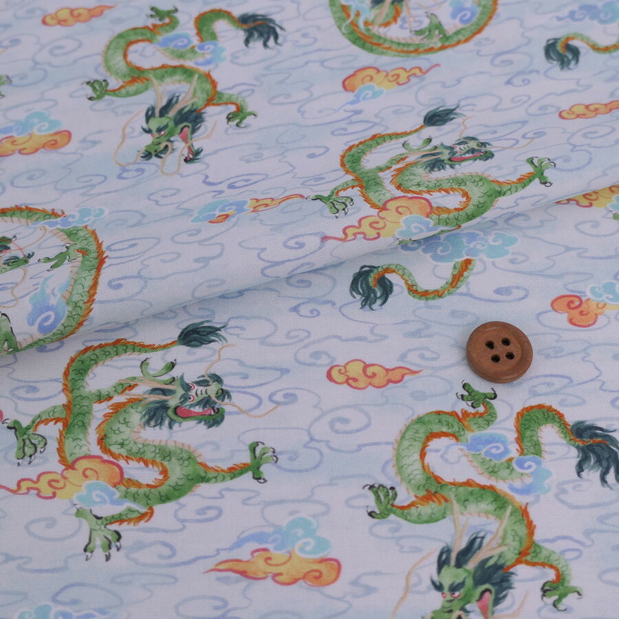 和柄コットン生地 雲海の龍(淡い水色) 10cm単位 切り売り