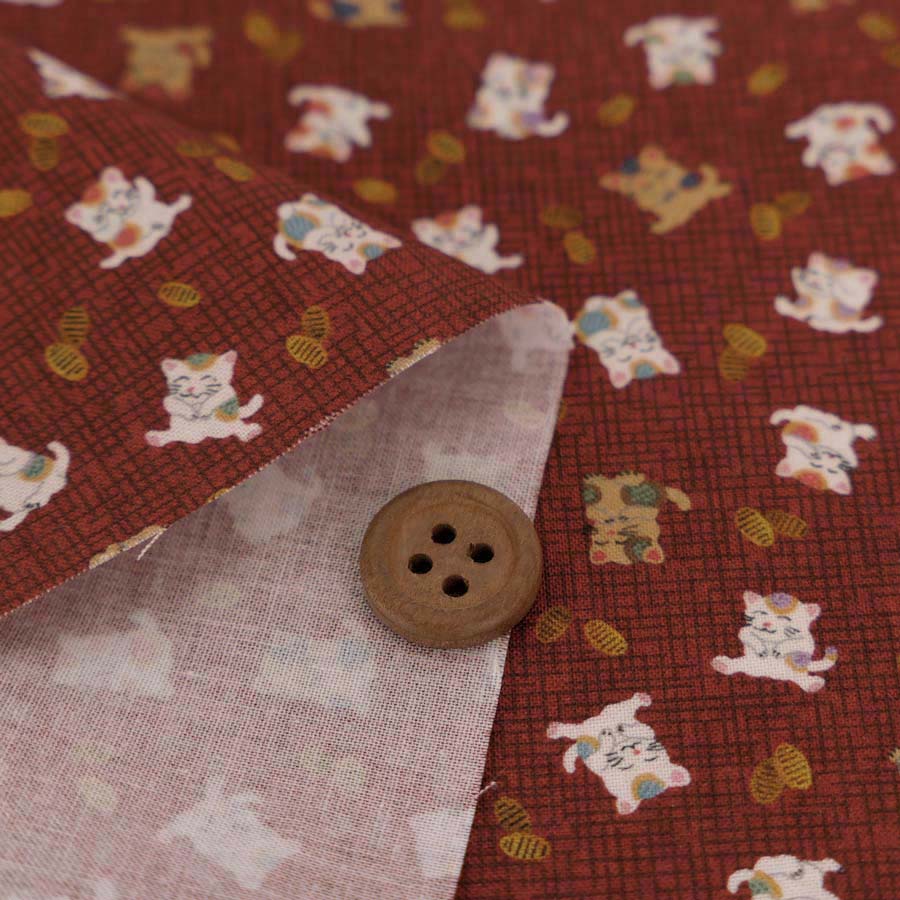 乐天商城 - 和柄コットン生地 招き猫に小判(れんが色) 10cm単位 切り売り