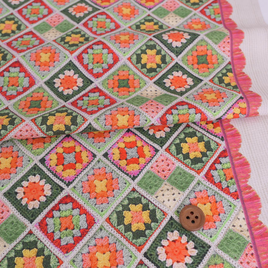 Rakuten - コットン生地 かぎ針編みのモチーフ柄(グリーンオレンジ) 10cm単位 切り売り