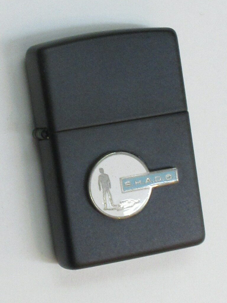 エイリアン防衛機構最高司令部（S.H.A.D.O.）バッジ貼り ブラックマットZippo 2001年1月製 未使用 (B-6..