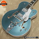 2023年、Gretschブランドは創業年から”ダブルプラチナ”となる140周年という大きな節目を迎えます。 140年にわたる確かなサウンドを祝して開発されたLimited Edition G6136T-140 Falconは、インスピレーションに満ちたグレッチの歴史を称え、次世代のサウンドスケープを作り出すプレイヤーに優れたパワーとトーンを提供します。 -主な特徴- ・ソリッドアディロンダックレッドスプルーストップ、メイプルバック＆サイド ・MLブレイシング ・22本のミディアムジャンボフレットと、マザーオブパールハンプブロックインレイを備えた、ロールオフ処理済み12インチラジアスエボニー指板 ・FT-67 Filter&#700;Tronハムバッカー ・エボニーベースのAdjusto-Maticブリッジ ・ストリングスルー式のBigsby B6CPテイルピース ・Grover Imperialロッキングチューナー ・140周年記念ヘッドプレート ・クロムハードウェア ・ニトロセルロースラッカーフィニッシュ ・Gretsch 17インチデラックスホロウボディハードシェルケース付属 -製品ハイライト- 【MLブレイシングのアディロンダックレッドスプルーストップ】 17インチ幅のホロウボディにソリッドアディロンダックレッドスプルースをトッピングし、バック＆サイドにはラミネートメイプルを採用。ボディ内部は、MLブレイシングで補強されています。 【フラッグシップFT-67 Filter&#700;Tronピックアップ】 FT-67 Filter&#700;Tronハムバッカーは、ヴィンテージGretschヴォイシングを再現しつつ、現代の演奏スタイルに合わせたトーンが得られるように設計されています。 このパワフルなピックアップは、オープンで煌めくトップエンド、艶のあるミッドレンジ、力強いローエンド、バランスの取れたハーモニクスを提供し、バンドアンサンブルで他の楽器とシームレスにブレンドする音色を実現します。 【多彩なコントロール】 各ピックアップのボリュームコントロール、マスターNo-Loadトーン、トレブルブリード回路付きマスターボリュームとを備え、直感的なサウンド設計が可能です。 【140周年記念仕様】 G6136T-140は、Pure Platinumのボディバック＆サイドにStone Platinumのボディトップを重ねたフィニッシュで、ピックガードとピックアップベゼル、G-Arrowコントロールノブ、シルバーバインディング、140周年記念ヘッドプレートが付いたマッチングヘッドストックといった特別な仕様でまとめ上げられています。 -FEATURES- ■ソリッドアディロンダックレッドスプルーストップ、メイプルバック＆サイド ■MLブレイシング ■22本のミディアムジャンボフレットと、マザーオブパールハンプブロックインレイを備えた、ロールオフ処理済み12インチラジアスエボニー指板 ■FT-67 Filter&#700;Tronハムバッカー ■エボニーベースのAdjusto-Maticブリッジ ■ストリングスルー式のBigsby B6CPテイルピース ■Grover Imperialロッキングチューナー ■140周年記念ヘッドプレート ■クロムハードウェア ■ニトロセルロースラッカーフィニッシュ ■Gretsch 17インチデラックスホロウボディハードシェルケース付属 -Specifications- ■Body Top: Solid Adirondack Red Spruce ■Body Back: Arched Laminated Maple ■Body Material: Laminated Maple ■Body Shape: Falcon ■Body Style: Gretsch Hollow Body Guitars ■Body Finish: Gloss Nitrocellulose Lacquer ■Bracing: ML Bracing ■Neck Material: Maple ■Neck Shape: Standard "U" ■Neck Finish: Gloss Nitrocellulose Lacquer ■Scale Length: 25.5" (64.77 cm) ■Fingerboard Material: Ebony ■Fingerboard Radius: 12" (305mm) ■Number of Frets: 22 ■Fret Size: Medium Jumbo ■Nut Material: Bone ■Nut Width: 1.6875" (42.86 mm) ■Position Inlays: Mother of Pearl Humpblocks ■Bridge Pickup: FT-67 Filter’Tron ■Neck Pickup: FT-67 Filter’Tron ■Controls: Volume 1. (Neck Pickup), Volume 2. (Bridge Pickup), Master Volume, Master Tone ■Pickup Switching: 3-Position Toggle: Position 1. Bridge Pickup, Position 2. Bridge and Neck Pickups, Position 3. Neck Pickup ■Bridge: Adjusto-Matic with Ebony Base ■Hardware Finish: Chrome ■Tailpiece: Bigsby B6CP String-Thru ■Tuning Machines: Grover Imperial Locking ■Pickguard: Silver Plexi with Silver Gretsch Logo & Falcon Graphic ■Control Knobs: Jeweled Arrow ■Color: Two-Tone Stone Platinum/Pure Platinum ■Strings: Nickel Plated Steel (.011-.049 Gauges) ■Case: Hard Case ■Weight: 約3.5kg