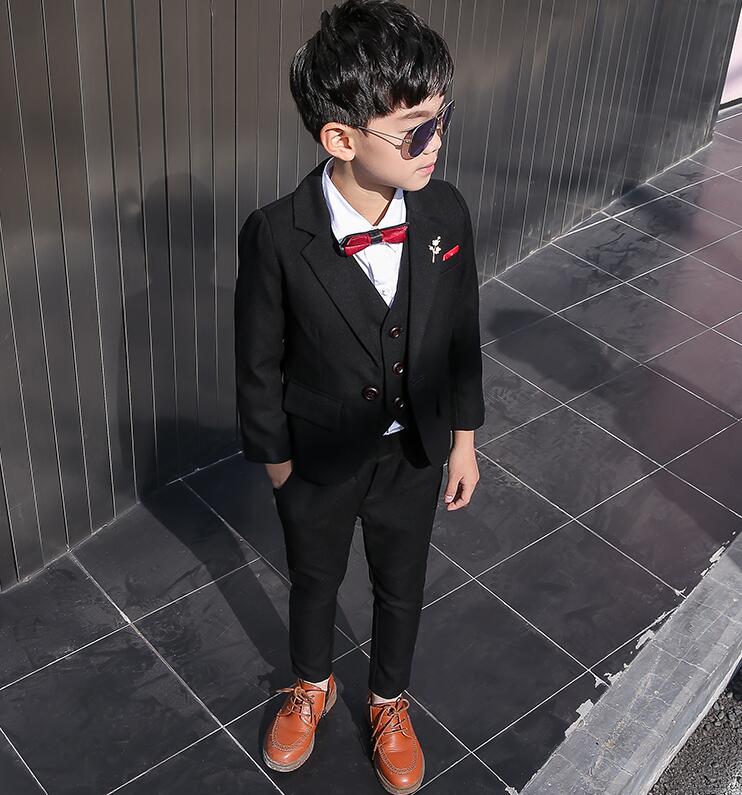 Rakuten - 【送料無料】子供スーツ セットアップ キッズスーツ 男の子 スーツ ジュニア スーツ イギリス風 上下セット フォーマルスーツ スーツ 子供 入学/卒園/卒業式 子ども用スーツ 男の子スーツ 結婚式 七五三 誕生日 発表会 5点セット ジャケット+ベスト+パンツ+蝶結び+コサージュ