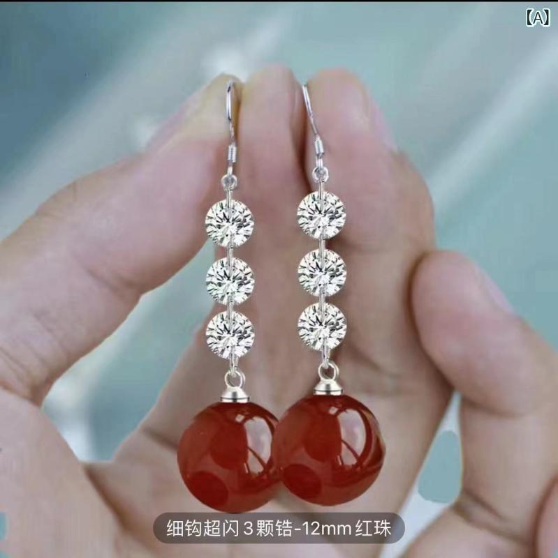 ピアス レディース シルバー パール 金属 銅 電気メッキ加工 ロング 揺れる 大ぶり...