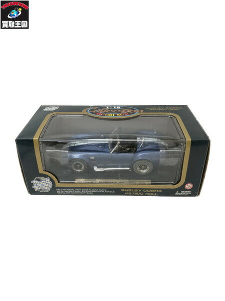 ※買取品のため【中古】扱いのお品になります。■商品名：ROAD　TOUGH　1/18　1964　SHELBY■サイズ：約　12x32x25 （センチ）■本体 〔S未開封　A開封/未使用　B開封/状態良好　C開封/小ダメージや一部欠品　D開封/大ダメージや大きな欠品〕状態ランク：C備考：汚れあり。塗装はげあり。※画像参照■箱 〔Sダメージなし　A軽いスレ程度　B角などに小ダメージ　C目立つダメージ　D形状を損なう大ダメージ〕状態ランク：C備考：キズ、汚れあり。　　　凹み、角つぶれあり。※画像参照■付属品・セット内容：画像のもので全てです。◆◆◆◆◆◆◆◆◆◆◆◆◆◆◆◆◆◆◆◆◆◆◆◆◆◆◆◆◆◆◆◆◇3万円以上クレジット決済(初回)ご利用のお客様へご注文の段階で『ご本人様確認』のお電話連絡をさせていただく場合がございます。※確認が取れない場合、ご注文がキャンセルとなってしまう場合がございますことご了承下さい。◇ご購入時の注意中古品であることをご理解頂き、状態などをご確認ください。データ反映のタイムラグにより、在庫切れ（商品をご用意できない）となる場合がございます。※ご不明点は、取扱い店舗までお問合せください。