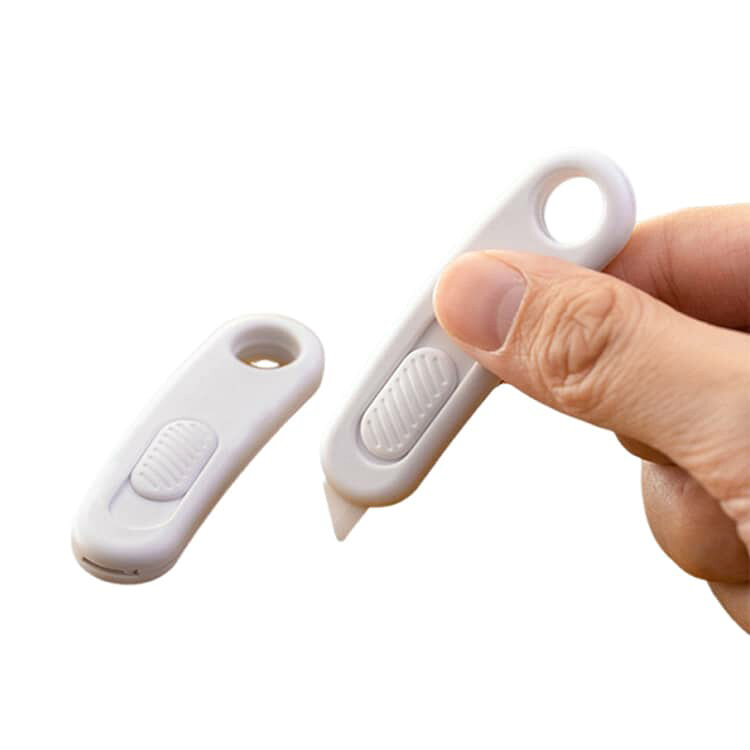ワンプライスの段ボールサイズ調整 牛乳パックカッター ダンボールカッター オープナー 錆びにくい ホワイト 刃交換式 開封機 ボックスカッター セラミック刃 工作 ボックスカッター おしゃれ カッター｜アングル2
