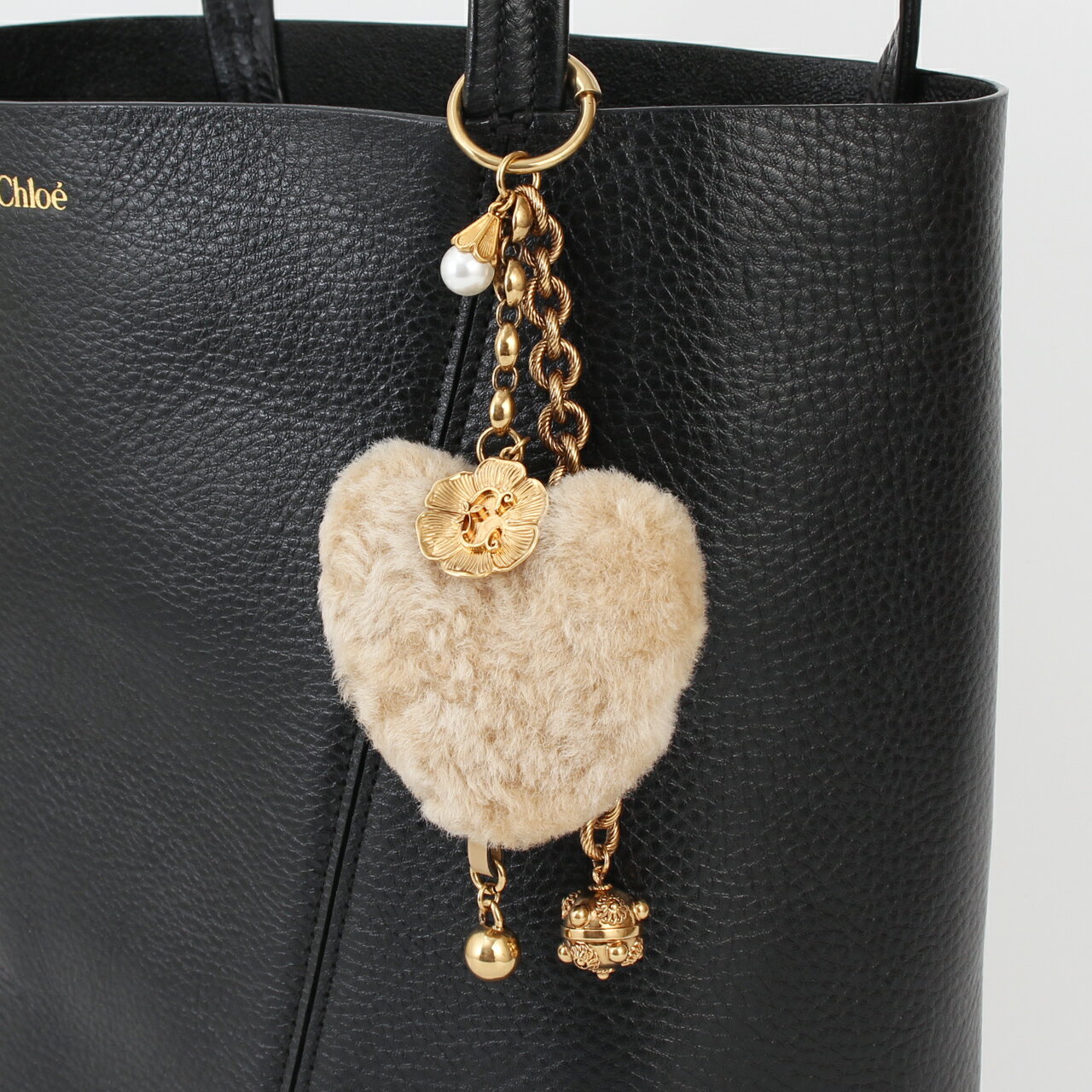 Rakuten - クロエ CHLOE チャーム CHLOE SYMBOLS HEART SHEARLING BAG CHARM [クロエシンボル ハートバッグチャーム] レディース CH25WK169 Q49