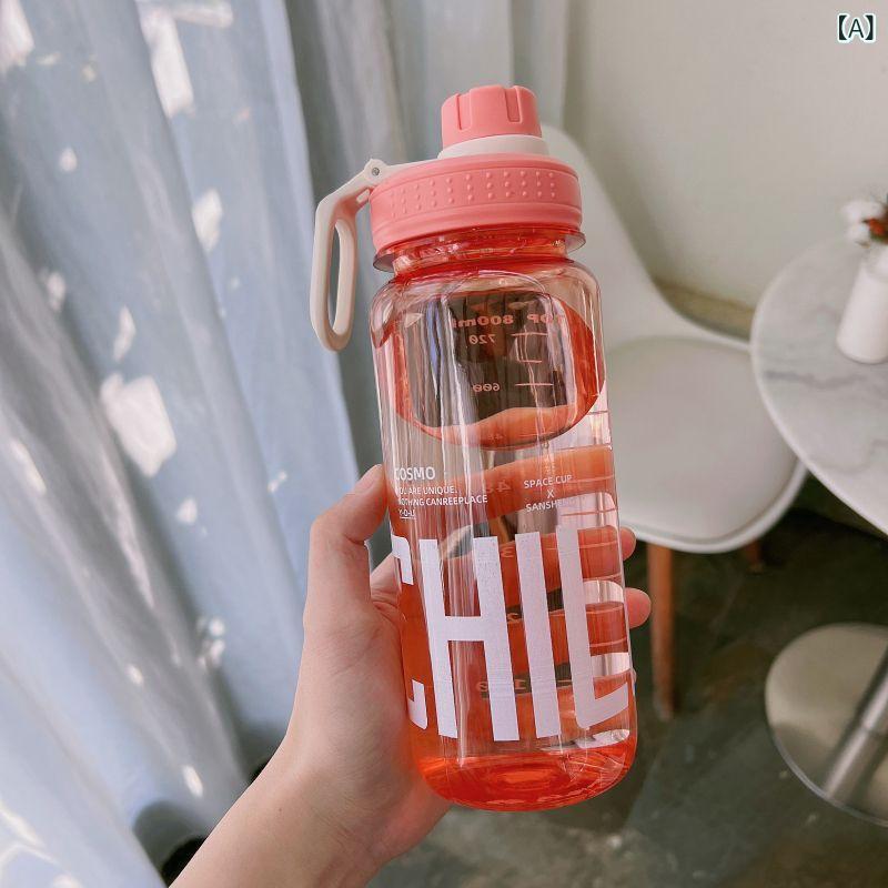 大容量 耐熱 食品級プラスチック 運動水筒 メンズ レディース ユニセックス フィットネス ジム 屋外 ハイキング 夏用 保冷保温 直飲み ポータブル ピンク ブラック ホワイト 600ml 800ml 1000ml 軽量 丸型 手持ち 日常使い 通勤