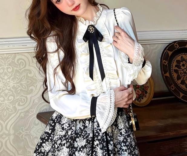 トップスブラウス長袖ボリューム袖萌...