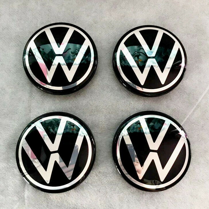 海外限定 フォルクスワーゲン Volkswagen のvwエンブレムロゴがデザインされた ホイールセンターキャップの１セット 4ピース です Vw ニューデザイン 5hg センターキャップ 欧車パーツbase 海外純正 4点セット ホイールキャップ