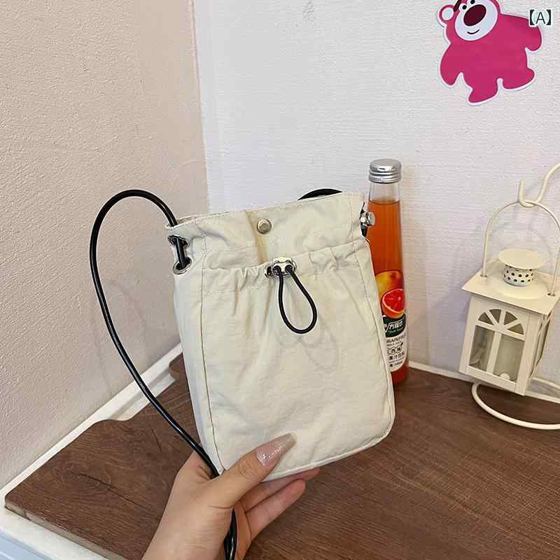 レディース バッグ 普段使い 秋冬 ミニ 小さめ ファッション 巾着 クロス ボディバッグ 携帯電話 白 ショルダー キー