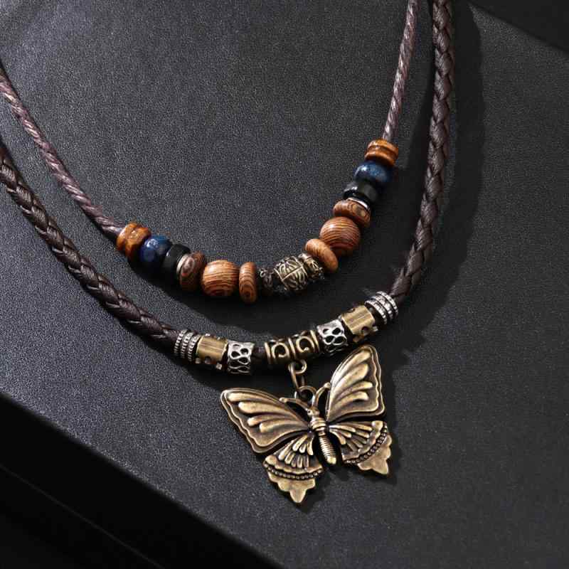 ネックレス ユニセックス 欧米風 レトロ 個性的 亜鉛合金 木製ビーズ 蝶々 メタルペンダント レザーコード セーターチェーン 多連 カジュアル アンティーク調 おしゃれ 電気メッキ加工