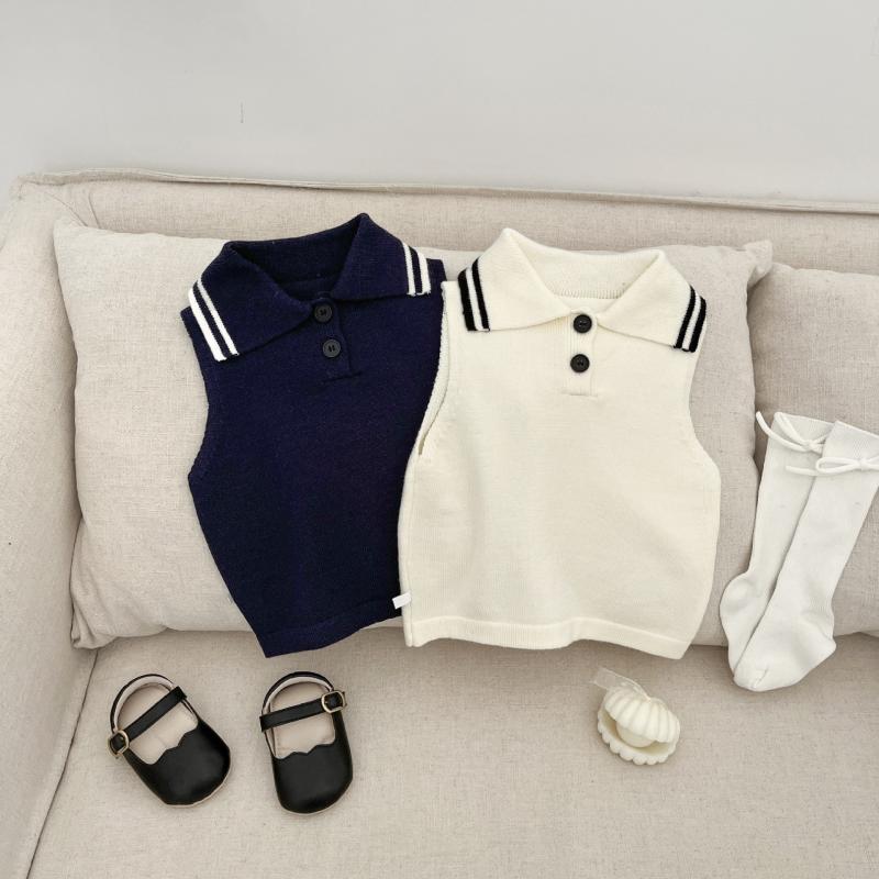 ・カテゴリ: キッズベスト・性別: 女性・スタイル: スクール・対象年齢: 1〜3歳・タイプ: プルオーバー・柄: 無地・厚さ: 薄手・: トレンディ・生地: ニット・主な素材: レーヨン50%・生地加工: 柔軟加工・基準: ・カラー展開: ホワイト、ネイビー・サイズ展開: 66、73、80、90、100