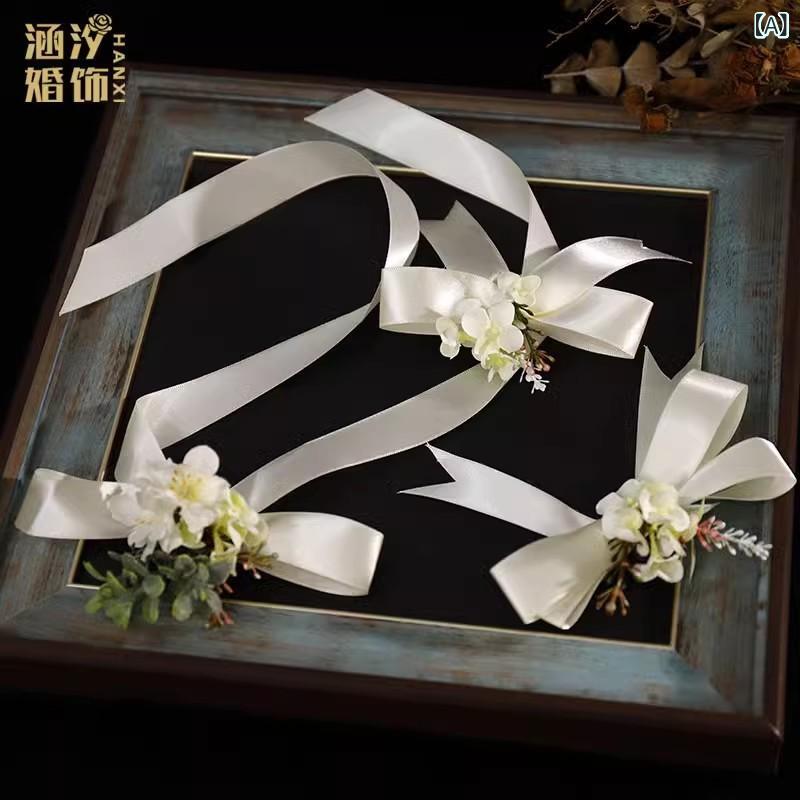 ヘアクリップ レディース かわいい ホワイト 白 フラワーモチーフ 造花 リボン 蝶々結び 結婚式 ウェデ..