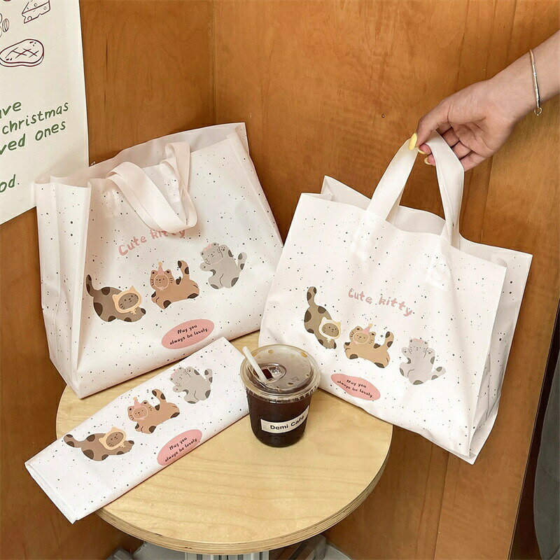 樂天商城 - 送料無料 50枚入 ラッピングバッグ PEバッグ 手提げ袋 手提げ 猫柄 ビニールバッグ ポリ袋 ラッピングバッグ ギフト用品 クッキー柄 包装資材 店舗用品 洋服店 ショップ用品 ラッピング袋 ギフトバッグ レジ袋 ビニール袋 透け感 シックバッグ 楽天海外通販