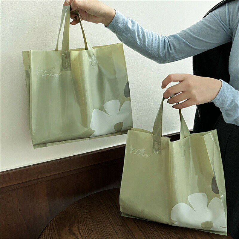 送料無料 50枚入 ラッピングバッグ PEバッグ 手提げ袋 手提げバッグ ビニールバッグ ポリ袋 ラッピングバッグ ギフト用品 クッキー柄 包装資材 店舗用品 洋服店 ショップ用品 ラッピング袋 ギフトバッグ レジ袋 ビニール袋 透け感 シックバッグ 楽天海外通販