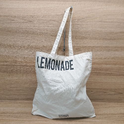 ◇ UNIVERSAL OVERALL プリント ブランドロゴ 薄手 シンプル オシャレ コンパクト トートバッグ ベージ..