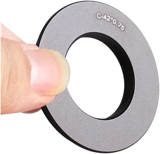 モデル番号:C-M42 リングアダプター メスマウント(内側):Cマウント(直径25.4mm / 25mmオプション)。 オスマウント(外側):42mm(直径)x1mm。材質:アルミニウム。 望遠鏡スレッドアダプターリング C / CS から M42 写真撮影用金属 T リングスレッド変換アダプター