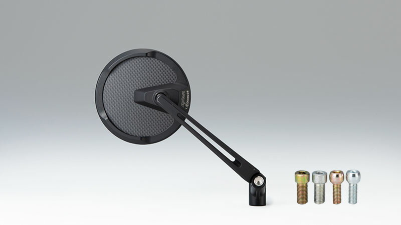 【デザイン】ラウンド 【アーム長】ショート（126mm） 【鏡面サイズ】直径94mm 【内容物】ミラー1個（左右兼用）・正ネジM10/逆ネジM10/正ネジM8/逆ネジ/M8・ミラーホールプラグ シンプルなデザインに漂うプレミアム感！ アルミダイキャスト製ボディと平織りの艶消しカーボンプレートのコンポジット仕様。 幅広いスタイルにも雰囲気を損なうことなく馴染むデザインを採用いたしました。 機能面においてはECE認証取得済で新保安基準（鏡面サイズ）を満たしている為、安心してご使用いただけます。 デザインは「オーバルエッジ」(TECH11)と「ラウンド」(TECH12)の2種類にアームの長さを2サイズ加えた計4種類より選択可能です。 ※本製品には衝撃緩和装置が備わっておりません。車両によっては別途必要となります。