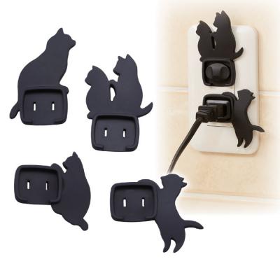 ねこのコンセントカバー 4個セット【割引不可品】 防災 コンセント キャップ カバー 火災 火事防止 安..