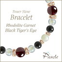 Rhodolite Garnet / Black Tiger's Eyeロードライトガーネット・ブラックタイガーアイ レディース誕生石ブレスレットパスクルでは、たくさんの種類のストーンを使用して、様々なデザインブレスレットを作成しています。天然石は流通している種類だけでも数百種類ですので、それらを組み合わせたデザインのバリエーションは無限大です。こちらは、細身の女性らしいデザインに、ロードライトガーネットをメインストーンとして、そしてサブストーンにブラックタイガーアイを組み合わせました。※Pascleでは素材の品質にもこだわって製作しております。Rhodolite Garnetロードライトガーネットロードライトガーネット（和名：薔薇石・薔薇柘榴石/ばらいし・ばらざくろいし）は、1月の誕生石ガーネットの一種で、紫色を帯びた赤色が特徴です。「パイロープ」、「アルマンディン」という赤色系の2種類のガーネットの中間の成分をもっています。透明度が高く、光に透けて赤紫色に輝くさまが上品で美しい石です。粒サイズ：8mm(±0.5mm)穴サイズ：0.8mm以上産地：ブラジル品質：表面にガーネット特有のクラックが見られる場合がございます。Black Tiger's Eyeブラックタイガーアイブラックタイガーアイは、ブラックカラーの石地の中にうっすらと見られるキャッツアイがかっこ良い天然石です。パッと見では普通のブラックカラーのパワーストーンに見えますが、良く見ると、きらっとしたキャッツアイが見られるので、じわじわとその美しさに魅入られてしまうと思います。 粒サイズ：6mm(±0.5mm)穴サイズ：0.8mm以上品質：キャッツアイの色合い・強さは、粒ごとに個体差がございます。Rainbow Quartzレインボークォーツレインボークォーツは、シャボン玉のような美しい輝きを持ったパワーストーンです。アクアオーラと同様に水晶を特殊な工程で加工して作られており、長くこの美しさが保たれます。他のクォーツ系など透明感のあるストーンと色合いの相性が良いです。本水晶はもちろん、アメジスト、フローライト、他のオーラ形ストーンなどとの組み合わせがおすすめです。粒サイズ：6mm(±0.5mm)穴サイズ：0.8mm以上産地：ブラジル(加工アメリカ)品質：写真のように、全粒にオーラ模様が見られます。Mother of Pearlマザーオブパールマザーオブパール（和名：真珠母貝/しんじゅぼかい）は、オフホワイトが可愛らしく、定番人気のパワーストーンです。当店では、ツヤ感があり、凹凸のほとんど見られない高品質なマザーオブパールを厳選してご用意しております。定番人気のカラーですので、水晶やパールを始め、ラベンダーアメジスト、ローズクォーツなど様々なカラーストーンと組み合わせられます。特に優しい色合いのストーンとの組み合わせがおすすめです。粒サイズ：6mm(±0.5mm)穴サイズ：0.8mm以上品質：粒ごとに写真のような貝殻模様が見られます。Size選べるサイズバリエーションSサイズ　内周14cm〜14.5cmMサイズ　内周15cm〜15.5cmLサイズ　内周16cm〜16.5cmLLサイズ　内周17cm〜17.5cmサイズにより、石の配置・数量が異なります。 なるべく現物に近いカラーで撮影するように心がけておりますが、ご利用の端末、ディスプレイによって実物と若干異なる場合がありますので、予めご了承ください。腕のサイズの測り方はこちらcomponent使用しているパワーストーンロードライトガーネット 8mmブラックタイガーアイ 6mmレインボークォーツ 6mmマザーオブパール 6mmHandmade1品1品、心を込めたハンドメイドパスクルのアクセサリーは、ご注文をいただいてからスタッフが、一つずつ心を込めてお作りしております。午前中までのご注文は、当日制作し、発送いたします。「子どものために●cmでつくってほしい」「この石を●●に差し替えてほしい」など、どのようなご要望でもできる限り対応いたします。Rubber String選べるゴム紐の種類アンタロンゴム（標準仕様）当店のブレスレットは、全品こちらの「アンタロンゴム（伸縮性あり）」を使用しております。耐久性も高く、透明の紐なので高級感があり石の美しさを引き立てます。オペロンゴム（オプション：無料）こちらは繊維状になったタイプの「オペロンゴム（伸縮性あり）」です。商品にあわせて2重、または4重で結びますので、いきなり切れてしまう心配はありません。BOX Wrappingジュエリーボックスジュエリーボックス、ショッピングバッグ（紙袋）ブレスレット専用のジュエリーボックスに入れて、リボン（ホワイト）を掛けた状態でお届けいたします。1注文ごとに、ショッピングバッグ1枚お届けいたします。※ショッピングバッグが付属する商品を2個以上のご注文の場合、通常の付属枚数は1枚です。2枚以上ご入用の場合は、備考欄にご記載ください。大切な人への特別な贈り物に。天然石のチャームがつく特別なラッピングでお届けします。※使用する石やサイズはランダムです。チャームは販売商品ではございません。料金：800円（税込）カラー・ホワイト×ピンクベージュ・ブラウン×ゴールドgreetingcard想いを伝えるグリーティングカード封筒入りのグリーティングカードをご用意しています。大切な人への贈りものに、メッセージを添えませんか？料金：350円（税込）カラー：ホワイト／ブラウン※イベントシーズンには限定カードもお選びいただけます※メッセージの印字も可能です（最大15字×5行）ご希望の場合はカートページの備考欄にご入力ください。Guarantee充実の保証パスクルはパワーストーンの通販専門ショップです。お客様に安心してご提供するために、充実した保証を提供いたします。30日間メンテナンス無料こちらの商品は到着から30日間のメンテナンス（サイズ調整・修理）を無料で承っております。（メンテナンスサービスのご利用にはパスクル会員登録が必要です。）「サイズを調整したい」「一部の石を交換したい」「ゴムが切れてしまった」どうぞお気軽にご相談ください。※追加ストーンの代金や往復に必要な送料は、お客様のご負担になります。※到着から30日以降も有償にてメンテナンス承ります。返品・交換対応いたします商品到着後、1週間以内にご連絡ください。返品・交換を承ります。以下は返品対象外となりますのでご注意ください。・お届けから8日以上が経過した商品・タグを切り取られた商品