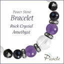 Amethyst / Black Spinelアメジスト・ブラックスピネル　メンズクリスタルブレスレットパスクルでは、たくさんの種類のストーンを使用して、様々なデザインブレスレットを作成しています。天然石は流通している種類だけでも数百種類ですので、それらを組み合わせたデザインのバリエーションは無限大です。こちらは、大粒のクリスタルをベースにして、アメジストとブラックスピネルを組み合わせたデザイン。※Pascleでは素材の品質にもこだわって製作しております。Rock Crystalクリスタル（本水晶）クリスタル（和名：本水晶/ほんすいしょう）は、4月の誕生石で、パワーストーンの中でも最も人気です。当店は「天然」のブラジル産本水晶に拘っており、クラックなどはなく、ツヤ感もあるとても上質な水晶をご用意しております。水晶は、どんなパワーストーンと組み合わせても大丈夫な万能ストーンです。カラーストーンと組み合わせても高級感のあるブレスレットに仕上がりますよ。粒サイズ：12mm(±0.5mm)穴サイズ：0.8mm以上産地：ブラジル品質：写真のとおり、透明感抜群で、傷などもありません。Amethystアメジストアメジスト（和名：紫水晶/紫水晶）は、2月の誕生石で、紫の宝石としても最も定番です。当店のアメジストは紫色が濃く、ツヤ感のある上質な粒をご用意しております。同じクォーツ系のシトリンやローズクォーツと組み合わせると色合いの相性も良いです。またブラックカラーと組み合わせると、メンズとしてもクールなデザインに仕上がります。粒サイズ：10mm(±0.5mm)穴サイズ：0.8mm以上産地：ブラジル品質：色合いは安定して近い色でご用意しておりますが、写真程度に色の濃淡があり、内部にクラックが含まれます。Black Spinelブラックスピネルブラックスピネル（和名：尖晶石/せんしょうせき）は、8月の誕生石で、輝きがブラックダイヤにも匹敵すると言われる今もなお人気上昇中のパワーストーン。当店では、スピネルの輝きが最大限に堪能できる高品質なスターカットを採用。キラキラとしたブラックの輝きは一般的なメンズアクセサリーにもピッタリ。 粒サイズ：8mm(±0.5mm)穴サイズ：0.8mm以上産地：スリランカ品質：写真のように上質なカットがキラキラと輝きます。Eye Agate天眼石天眼石（別名：チベットアゲート）は、角度によって目玉のように見える。白い縞模様が特徴です。当店では上質な天眼石をご用意しておりますので、縞模様が各粒にしっかりと見られます。お守り系のストーンと組み合わせて、厄除けなどのお守りアイテムを作るのに人気です。粒サイズ：8mm(±0.5mm)穴サイズ：0.8mm以上産地：チベット品質：粒ごとに縞模様が異なります。Size選べるサイズバリエーションSサイズ　内周15cm〜15.5cmMサイズ　内周16cm〜16.5cmLサイズ　内周17cm〜17.5cmLLサイズ　内周18cm〜18.5cm3Lサイズ　内周19cm〜19.5cm4Lサイズ　内周20cm〜20.5cmサイズにより、石の配置・数量が異なります。 なるべく現物に近いカラーで撮影するように心がけておりますが、ご利用の端末、ディスプレイによって実物と若干異なる場合がありますので、予めご了承ください。腕のサイズの測り方はこちらcomponent使用しているパワーストーンクリスタル（本水晶） 12mmアメジスト 10mmブラックスピネル 8mm天眼石 8mmクリスタル（本水晶） 8mmHandmade1品1品、心を込めたハンドメイドパスクルのアクセサリーは、ご注文をいただいてからスタッフが、一つずつ心を込めてお作りしております。午前中までのご注文は、当日制作し、発送いたします。「子どものために●cmでつくってほしい」「この石を●●に差し替えてほしい」など、どのようなご要望でもできる限り対応いたします。Rubber String選べるゴム紐の種類アンタロンゴム（標準仕様）当店のブレスレットは、全品こちらの「アンタロンゴム（伸縮性あり）」を使用しております。耐久性も高く、透明の紐なので高級感があり石の美しさを引き立てます。オペロンゴム（オプション：無料）こちらは繊維状になったタイプの「オペロンゴム（伸縮性あり）」です。商品にあわせて2重、または4重で結びますので、いきなり切れてしまう心配はありません。BOX Wrappingジュエリーボックスジュエリーボックス、ショッピングバッグ（紙袋）ブレスレット専用のジュエリーボックスに入れて、リボン（ホワイト）を掛けた状態でお届けいたします。1注文ごとに、ショッピングバッグ1枚お届けいたします。※ショッピングバッグが付属する商品を2個以上のご注文の場合、通常の付属枚数は1枚です。2枚以上ご入用の場合は、備考欄にご記載ください。大切な人への特別な贈り物に。天然石のチャームがつく特別なラッピングでお届けします。※使用する石やサイズはランダムです。チャームは販売商品ではございません。料金：800円（税込）カラー・ホワイト×ピンクベージュ・ブラウン×ゴールドgreetingcard想いを伝えるグリーティングカード封筒入りのグリーティングカードをご用意しています。大切な人への贈りものに、メッセージを添えませんか？料金：350円（税込）カラー：ホワイト／ブラウン※イベントシーズンには限定カードもお選びいただけます※メッセージの印字も可能です（最大15字×5行）ご希望の場合はカートページの備考欄にご入力ください。Guarantee充実の保証パスクルはパワーストーンの通販専門ショップです。お客様に安心してご提供するために、充実した保証を提供いたします。30日間メンテナンス無料こちらの商品は到着から30日間のメンテナンス（サイズ調整・修理）を無料で承っております。（メンテナンスサービスのご利用にはパスクル会員登録が必要です。）「サイズを調整したい」「一部の石を交換したい」「ゴムが切れてしまった」どうぞお気軽にご相談ください。※追加ストーンの代金や往復に必要な送料は、お客様のご負担になります。※到着から30日以降も有償にてメンテナンス承ります。返品・交換対応いたします商品到着後、1週間以内にご連絡ください。返品・交換を承ります。以下は返品対象外となりますのでご注意ください。・お届けから8日以上が経過した商品・タグを切り取られた商品