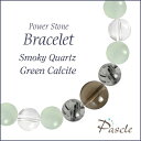 Smoky Quartz / Green Calciteスモーキークォーツ・グリーンカルサイト　メンズデザインブレスレットパスクルでは、たくさんの種類のストーンを使用して、様々なデザインブレスレットを作成しています。天然石は流通している種類だけでも数百種類ですので、それらを組み合わせたデザインのバリエーションは無限大です。こちらは、スモーキークォーツをトップに、トルマリンクォーツ・グリーンカルサイトをベースに組み合わせました。石のサイズは小さく落ち着いた雰囲気なので、どんなシーンや年齢層の方でも使いやすいデザインです。Smoky Quartzスモーキークォーツスモーキークォーツ（和名：煙水晶/けむりすいしょう）は、落ち着いたスモーキーブラウンで、どこか頼もしい印象を受けます。当店では、深みのあるブランカラーで透明感がしっかりとあり、内傷等も見られない高品質なスモーキークォーツをご用意しております。 粒サイズ：10mm(±0.5mm)穴サイズ：0.8mm以上産地：ブラジル品質：茶色の濃さは、粒ごとに個体差がございます。Green Calciteグリーンカルサイトグリーンカルサイト（和名：方解石/ほうかいせき）は、爽やかなライムグリーンカラーが印象的な天然石です。こちらはほんのりと透明感があり、カルサイトらしい上品な色合いの高品質なグリーンカルサイトです。他の淡い色合いのストーンと組み合わせると色合いの相性が良いです。アラゴナイトやラベンダーアメジスト、ローズクォーツやアクアマリンなどもおすすめです。粒サイズ：8mm(±0.5mm)穴サイズ：0.8mm以上産地：アフガニスタン品質：色むら等は少ないです。またカルサイト特有のほんのりとした縦線模様も見られます。Tourmalinated Quartzトルマリンクォーツトルマリンクォーツ(和名：電気石入り水晶)は、 名前の通り、「トルマリン」を含んだ「クォーツ（水晶）」です。こちらは半透明の水晶の中に、黒い針が入り乱れた、モノトーンカラーが美しいトルマリンクォーツです。お守り系のストーンと組み合わせて、厄除けなどのお守りアイテムを作るのに人気です。粒サイズ：8mm(±0.5mm)穴サイズ：0.8mm以上品質：粒ごとにインクルージョン（トルマリン）の入り方・量・色味が異なります。ご希望のお色味がございましたら、在庫の中でなるべくご希望に添えられるものを厳選しますので、ご注文時の「備考欄」へご記載ください。Rock Crystalクリスタル（本水晶）クリスタル（和名：本水晶/ほんすいしょう）は、4月の誕生石で、パワーストーンの中でも最も人気です。当店は「天然」のブラジル産本水晶に拘っており、クラックなどはなく、ツヤ感もあるとても上質な水晶をご用意しております。 水晶は、どんなパワーストーンと組み合わせても大丈夫な万能ストーンです。カラーストーンと組み合わせても高級感のあるブレスレットに仕上がります。粒サイズ：8mm(±0.5mm)穴サイズ：0.8mm以上産地：ブラジル品質：写真のとおり、透明感抜群で、傷等もありません。Size選べるサイズバリエーションSサイズ　内周15cm〜15.5cmMサイズ　内周16cm〜16.5cmLサイズ　内周17cm〜17.5cmLLサイズ　内周18cm〜18.5cm3Lサイズ　内周19cm〜19.5cm4Lサイズ　内周20cm〜20.5cmサイズにより、石の配置・数量が異なります。 なるべく現物に近いカラーで撮影するように心がけておりますが、ご利用の端末、ディスプレイによって実物と若干異なる場合がありますので、予めご了承ください。腕のサイズの測り方はこちらcomponent使用しているパワーストーンスモーキークォーツ 10mmグリーンカルサイト 8mmトルマリンクォーツ 8mmクリスタル（本水晶） 8mmスモーキークォーツ 8mmクリスタル（本水晶） 7mmHandmade1品1品、心を込めたハンドメイドパスクルのアクセサリーは、ご注文をいただいてからスタッフが、一つずつ心を込めてお作りしております。午前中までのご注文は、当日制作し、発送いたします。「子どものために●cmでつくってほしい」「この石を●●に差し替えてほしい」など、どのようなご要望でもできる限り対応いたします。Rubber String選べるゴム紐の種類アンタロンゴム（標準仕様）当店のブレスレットは、全品こちらの「アンタロンゴム（伸縮性あり）」を使用しております。耐久性も高く、透明の紐なので高級感があり石の美しさを引き立てます。オペロンゴム（オプション：無料）こちらは繊維状になったタイプの「オペロンゴム（伸縮性あり）」です。商品にあわせて2重、または4重で結びますので、いきなり切れてしまう心配はありません。BOX Wrappingジュエリーボックスジュエリーボックス、ショッピングバッグ（紙袋）ブレスレット専用のジュエリーボックスに入れて、リボン（ホワイト）を掛けた状態でお届けいたします。1注文ごとに、ショッピングバッグ1枚お届けいたします。※ショッピングバッグが付属する商品を2個以上のご注文の場合、通常の付属枚数は1枚です。2枚以上ご入用の場合は、備考欄にご記載ください。大切な人への特別な贈り物に。天然石のチャームがつく特別なラッピングでお届けします。※使用する石やサイズはランダムです。チャームは販売商品ではございません。料金：800円（税込）カラー・ホワイト×ピンクベージュ・ブラウン×ゴールドgreetingcard想いを伝えるグリーティングカード封筒入りのグリーティングカードをご用意しています。大切な人への贈りものに、メッセージを添えませんか？料金：350円（税込）カラー：ホワイト／ブラウン※イベントシーズンには限定カードもお選びいただけます※メッセージの印字も可能です（最大15字×5行）ご希望の場合はカートページの備考欄にご入力ください。Guarantee充実の保証パスクルはパワーストーンの通販専門ショップです。お客様に安心してご提供するために、充実した保証を提供いたします。30日間メンテナンス無料こちらの商品は到着から30日間のメンテナンス（サイズ調整・修理）を無料で承っております。（メンテナンスサービスのご利用にはパスクル会員登録が必要です。）「サイズを調整したい」「一部の石を交換したい」「ゴムが切れてしまった」どうぞお気軽にご相談ください。※追加ストーンの代金や往復に必要な送料は、お客様のご負担になります。※到着から30日以降も有償にてメンテナンス承ります。返品・交換対応いたします商品到着後、1週間以内にご連絡ください。返品・交換を承ります。以下は返品対象外となりますのでご注意ください。・お届けから8日以上が経過した商品・タグを切り取られた商品