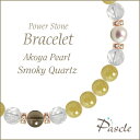 Gold Rutilated Quartz / Smoky Quartzゴールドルチルクォーツ・スモーキークォーツ　パールデザインブレスレットパスクルでは、たくさんの種類のストーンを使用して、様々なデザインブレスレットを作成しています。天然石は流通している種類だけでも数百種類ですので、それらを組み合わせたデザインのバリエーションは無限大です。こちらは、アコヤ真珠をトップの1つとして使用し、スモーキークォーツを対の位置に配置、ベースカラーとなるゴールドルチルクォーツを組み合わせました。※素材の品質にこだわり、ご注文を頂いてから制作致します。Akoya Pearlアコヤ真珠アコヤ真珠は、日本が世界に誇る本真珠で、6月の誕生石の一つです。当店では、パワーストーンショップとしては珍しく、真円（ラウンド）で照りの良い高品質なアコヤ真珠をご用意しております。粒サイズ：6mm(±0.5mm)穴サイズ：0.8mm以上産地：日本品質：写真のとおりほんのりピンク〜ホワイトカラーの色合いです。Smoky Quartzスモーキークォーツスモーキークォーツ（和名：煙水晶/けむりすいしょう）は、落ち着いたスモーキーブラウンで、どこか頼もしい印象を受けます。当店では、深みのあるブランカラーで透明感がしっかりとあり、内傷等も見られない高品質なスモーキークォーツをご用意しております。 粒サイズ：6mm(±0.5mm)穴サイズ：0.8mm以上産地：ブラジル品質：茶色の濃さは、粒ごとに個体差がございます。Gold Rutilated Quartzゴールドルチルクォーツルチルクォーツ（和名：金針水晶/きんばりすいしょう）は、その名のとおり「金色の針」が最大の特徴です。当店のルチルクォーツは金色の濃さと針の量に拘っており、まさに「ゴールドルチル」をお楽しみ頂けます 粒サイズ：6mm(±0.5mm)穴サイズ：0.8mm以上産地：ブラジル品質：金針の入り方、量は粒ごとに異なります。Size選べるサイズバリエーションSサイズ　内周14cm〜14.5cmMサイズ　内周15cm〜15.5cmLサイズ　内周16cm〜16.5cmLLサイズ　内周17cm〜17.5cmサイズにより、石の配置・数量が異なります。 なるべく現物に近いカラーで撮影するように心がけておりますが、ご利用の端末、ディスプレイによって実物と若干異なる場合がありますので、予めご了承ください。腕のサイズの測り方はこちらcomponent使用しているパワーストーンアコヤ真珠 6mmスモーキークォーツ 6mmゴールドルチルクォーツ 6mmクリスタル（本水晶） 6mmHandmade1品1品、心を込めたハンドメイドパスクルのアクセサリーは、ご注文をいただいてからスタッフが、一つずつ心を込めてお作りしております。午前中までのご注文は、当日制作し、発送いたします。「子どものために●cmでつくってほしい」「この石を●●に差し替えてほしい」など、どのようなご要望でもできる限り対応いたします。Rubber String選べるゴム紐の種類アンタロンゴム（標準仕様）当店のブレスレットは、全品こちらの「アンタロンゴム（伸縮性あり）」を使用しております。耐久性も高く、透明の紐なので高級感があり石の美しさを引き立てます。オペロンゴム（オプション：無料）こちらは繊維状になったタイプの「オペロンゴム（伸縮性あり）」です。商品にあわせて2重、または4重で結びますので、いきなり切れてしまう心配はありません。BOX Wrappingジュエリーボックスジュエリーボックス、ショッピングバッグ（紙袋）ブレスレット専用のジュエリーボックスに入れて、リボン（ホワイト）を掛けた状態でお届けいたします。1注文ごとに、ショッピングバッグ1枚お届けいたします。※ショッピングバッグが付属する商品を2個以上のご注文の場合、通常の付属枚数は1枚です。2枚以上ご入用の場合は、備考欄にご記載ください。大切な人への特別な贈り物に。天然石のチャームがつく特別なラッピングでお届けします。※使用する石やサイズはランダムです。チャームは販売商品ではございません。料金：800円（税込）カラー・ホワイト×ピンクベージュ・ブラウン×ゴールドgreetingcard想いを伝えるグリーティングカード封筒入りのグリーティングカードをご用意しています。大切な人への贈りものに、メッセージを添えませんか？料金：350円（税込）カラー：ホワイト／ブラウン※イベントシーズンには限定カードもお選びいただけます※メッセージの印字も可能です（最大15字×5行）ご希望の場合はカートページの備考欄にご入力ください。Guarantee充実の保証パスクルはパワーストーンの通販専門ショップです。お客様に安心してご提供するために、充実した保証を提供いたします。30日間メンテナンス無料こちらの商品は到着から30日間のメンテナンス（サイズ調整・修理）を無料で承っております。（メンテナンスサービスのご利用にはパスクル会員登録が必要です。）「サイズを調整したい」「一部の石を交換したい」「ゴムが切れてしまった」どうぞお気軽にご相談ください。※追加ストーンの代金や往復に必要な送料は、お客様のご負担になります。※到着から30日以降も有償にてメンテナンス承ります。返品・交換対応いたします商品到着後、1週間以内にご連絡ください。返品・交換を承ります。以下は返品対象外となりますのでご注意ください。・お届けから8日以上が経過した商品・タグを切り取られた商品