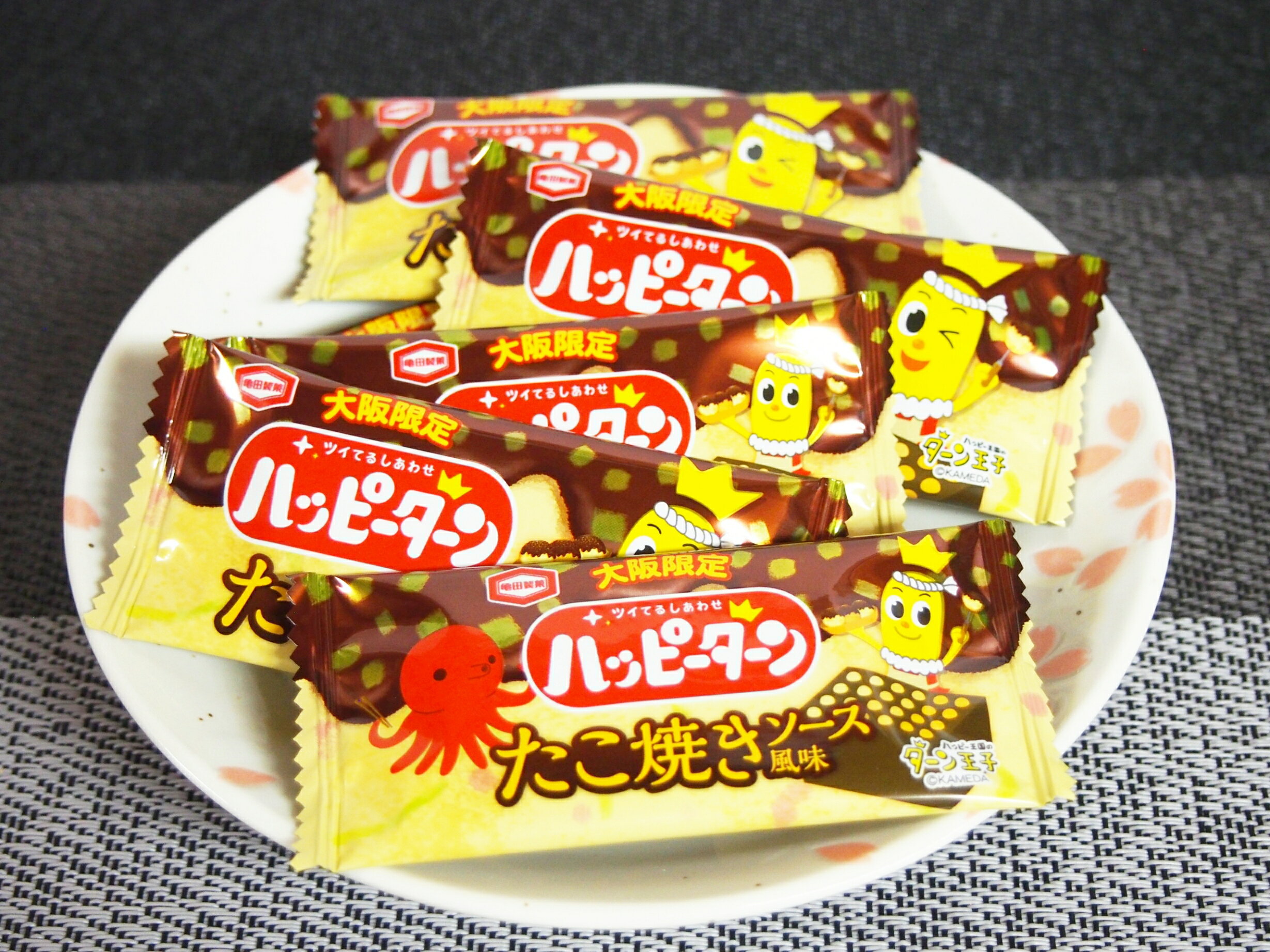 大阪 おみやげ お土産 亀田製菓 ハッピーターン たこ焼きソース風味 16袋入り ご当...