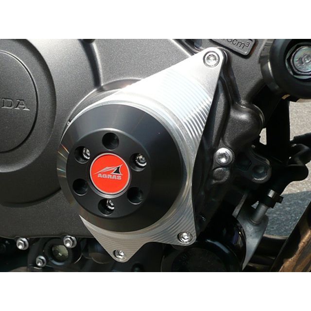 ●メーカー名：アグラス / AGRAS●商品名：レーシングスライダー クランクC●カラー ジュラコン/ブラック・カラー：ジュラコン/ホワイトはこちら●メーカー品番：342-176-005B商品の保証は、メーカー保証書の内容に準じます。商品内容クランクC（アルミベース＋ジュラコン（R））備考エンジン右側のケースカバーのボルトと共締めで取り付けます。カウルを加工する事無く装着が可能です。ご注意※走行条件等によっては車両のバンク角が損なわれる場合がございます。ご注意ください。※ジュラコン（R）はポリプラスチックス株式会社の日本その他の国の登録商標です。※画像はジュラコン（R）/ブラックのイメージです。※掲載画像はイメージです。実際の商品とは色味や仕様が異なる場合がございます。メーカー車種年式型式・フレームNo.その他ホンダCB1000R※商品掲載時の適合情報です。年式が新しい車両については、必ずメーカーサイトにて適合をご確認ください。