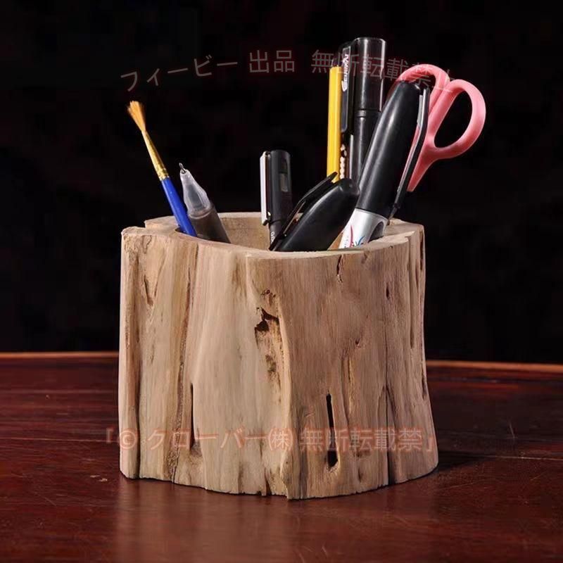 全体のサイズ：10＊10cm　材質：木製　 自然の風合いが人気のペン立てが登場！ チックの幹の部分の加工品で複雑な節やかたちから高級感があります。 頑丈、コンパクトです。オフィス用も、学校用もお楽しみます。