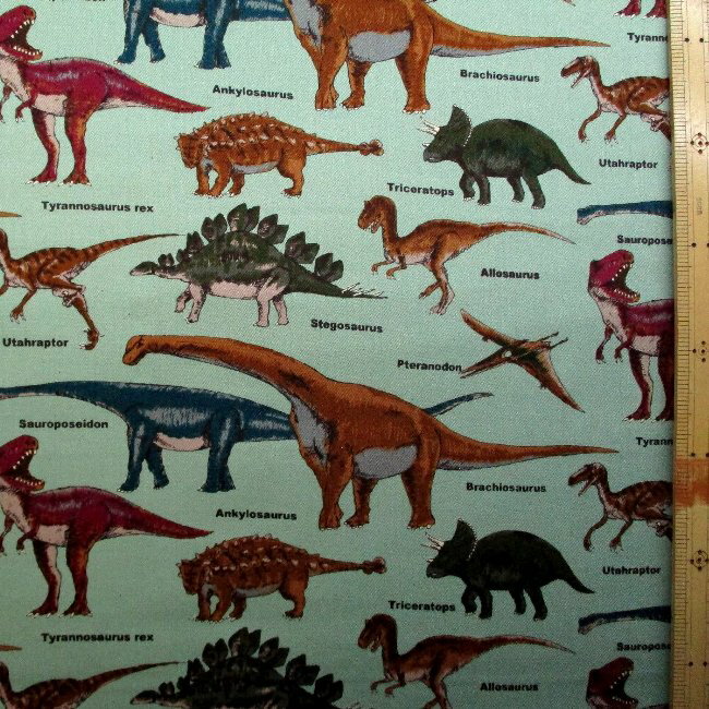 プリント生地 布 恐竜図鑑（ グリーン系 ) ツイル （ オックスより厚手の生地です ）（ 綿100％ ）生地幅−約108cm （ 恐竜生地 恐竜 生地 きょうりゅう サウルス トリケラトプス ティラノザウルス 動物 生き物 カッコイイ 青緑 )