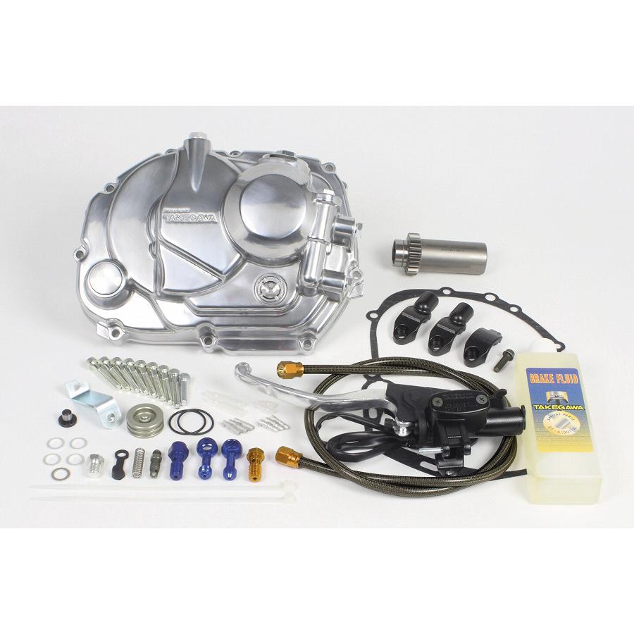 メーカー名：スペシャルパーツタケガワメーカー品番：02-01-0412販売備考：旧品番 02-01-0160適合情報：カワサキ[KAWASAKI] Z125 PRO◆純正クラッチカバーには無いオイル点検窓や、オイルクーラー装着時のオーバークールを防止するサーモスタットユニットの取付けが出来る特許構造を採用した、ハイクオリティークラッチカバー ◆プライマリドライブギア付き ◆対応車種：Z125 PRO(BR125H-A02621〜) ◆カバー本体はアルミニウムダイカスト製にバフ研磨後クリア塗装が施され、美しく仕上げられています ◆ノーマルクラッチカバーとは全く異なるカバー形状と表面処理により、エンジンにインパクトを与え、車両を美しく演出します ◆クラッチカバーにはSP TAKEGAWA ロゴ入り 【油圧式】 ・手動油圧式はワイヤー式に比べ、更にクラッチの操作性を高め、クラッチワークによる疲労を軽減します ・油圧式キットにはバックミラーホルダーの付け替えができるクイックリリースタイプの2WAYクイックマスターシリンダーが付属しています ・本製品は手動ワイヤー式と油圧式のどちらにも使用可能なクラッチカバー構造を採用しています 【オイル取出し口を標準装備】 ・クラッチカバー本体にオイル取出し口が備えている為、オイルクーラーへのオイルの取出しが可能です ・オイル取出し口を使用しない場合は付属のブラインドプラグを使用します 【エンジンオイル確認窓を装備】 ・純正クラッチカバーには無い、エンジンオイル量の確認を行える確認窓を装備 ・窓には耐久性の高いガラスを採用 【大型フィラーキャップ(アルミダイカスト製クロムメッキ仕上げ)】 ・純正に比べ注油口を大きくすることでオイル注入が容易に行えます 【クラッチカバーの特許取得構造】（サーモスタット取付け部とオイルライン構造) ・サーモスタット(別売)の取付けを可能としたSP TAKEGAWA 製だけの特許取得構造を採用しています ・オリジナルオイルライン構造により、サーモスタットユニットを装着することでオイルクーラー装着時のオーバークールを防止します(SP TAKEGAWA 製Z125 PRO用オイルクーラーキットがあります。) ◆SP TAKEGAWA 製プライマリードリブンギアは純正よりも大幅な重量軽減となり、スロットルレスポンスを向上させ、クランクシャフトの回転を100%二次側クラッチに伝達することが出来ます ◆対応クラッチ：ノーマルクラッチ車 / SP TAKEGAWA 製6ディスク強化クラッチ ※注意事項※ ・サーモスタットユニットを装着するにはSP TAKEGAWA 製オイルクーラーとの同時装着が必要になります