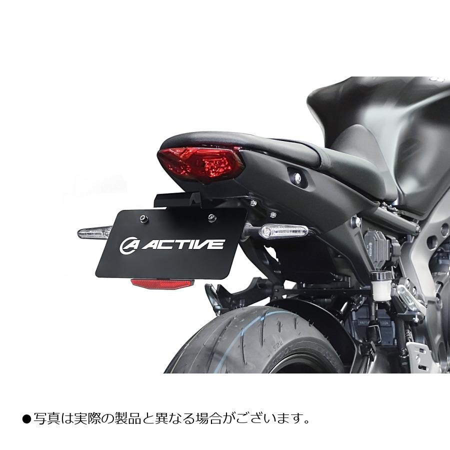 メーカー名：アクティブメーカー品番：1153068カタログ品番：P106-4527車体に加工が必要なく、ノーマルウィンカーの取り付けはもちろん、装着位置やステーの形状にまでこだわった、スタイリッシュかつ車検に対応するフェンダーレスキットです。販売備考：●スリムリフレクターが付属しています。ナンバー角度：40&deg;適合情報：ヤマハ[YAMAHA] MT-09 21-22色[カラー]：ブラック材質[素材]：アルミ製仕様：LEDナンバー灯仕様キット内容：◆ベースステー：1◆サイドステー左右：各1◆ナンバーステー：1◆ウィンカーステー：1◆LEDナンバー灯(M5×10ボルト2本付)：1◆キーマウント：1◆ウィンカースペーサー：2◆リフレクター(ナット・スプリングワッシャー付）：1◆フランジボルトM6×35：4◆皿ボルトM6×20：2◆フランジロックナットM6：6◆ボタンボルトM4×6：3◆タイラップ100mm：3付属品：汎用リフレクターキット付属/TYPE-3スリムタイプライセンス灯[有/無]：LEDナンバー灯◆車体に加工が必要なく、ノーマルウィンカーの取り付けはもちろん、装着位置やステーの形状にまでこだわった、スタイリッシュかつ車検に対応するフェンダーレスキットです◆ナンバー灯：LEDナンバー灯付き◆カラー：ブラック◆ナンバー角度：40°※ご注意ください※・スリムリフレクターが付属しています・「アクティブLEDウインカー」(別売)装着可・また、純正ウィンカー取付穴を無くす「純正ウィンカーレスステー」(別売)もご用意しています・車検証に記載された車両全長から±30mm以上変わると、構造変更が必要になる場合があります・車検場で指示があった場合は、検査官に従い記載事項の変更を受けてください